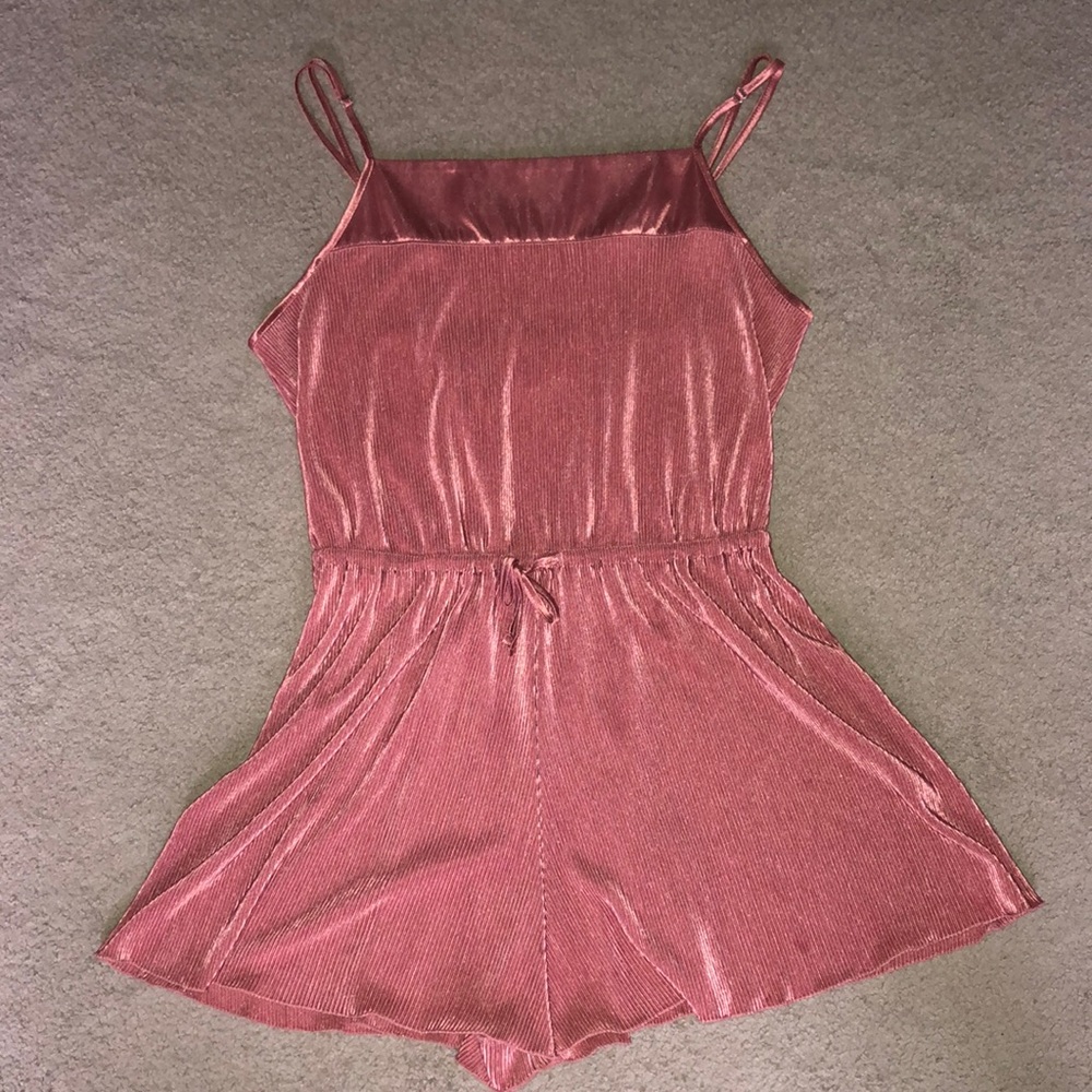 pink romper with triangle strap detail